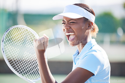 Image of Winner, tennis and celebration of black woman on court after winning match, game or competition. Achievement, success and happy or excited female athlete celebrate sports, workout or exercise goals.