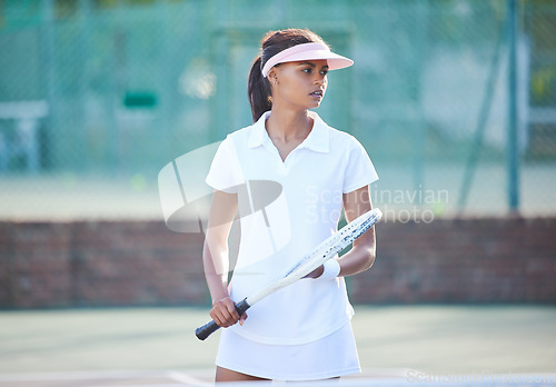 Image of Tennis, start or serious woman on court ready for match, training game or match in competition. Fitness, sports racket or focused young female athlete in Spain to begin cardio workout or exercise