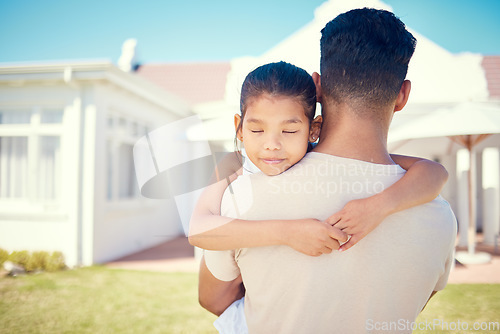 Image of Man, girl child and back at new home, outdoor and hug together for love, beginning and start to life in neighborhood. Father, female kid or tired daughter with sleeping, real estate and house on lawn