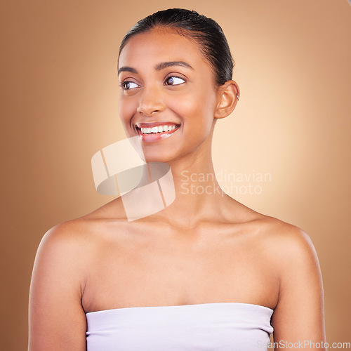 Image of Skincare, beauty and face of Indian woman for wellness, healthy skin and facial treatment in studio. Dermatology, luxury spa mockup and isolated happy girl confident with makeup, cosmetics and smile