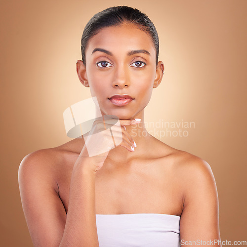 Image of Skincare, natural beauty and woman portrait in a studio for wellness and dermatology. Cosmetics, model and facial glow of a young person self care, makeup and healthy face shine from cosmetology