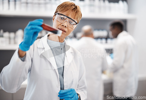 Image of Blood, science and woman scientist in laboratory with sample for research, medical study and investigation. Healthcare, pharmaceutical and female with vial for dna testing, biology and rna analysis