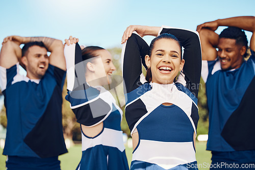 Image of Cheerleader training or people in team stretching on a outdoor stadium field for fitness exercise. Funny cheerleading group, sports portrait or happy students game ready for cheering, match or event