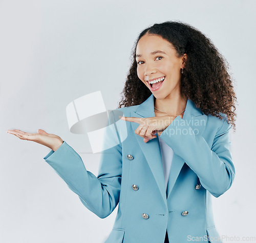 Image of Business woman, studio and hand with space for product placement, sale or promotion deal. Happy female show hands or palm gesture for mockup, branding or advertising isolated on a white background