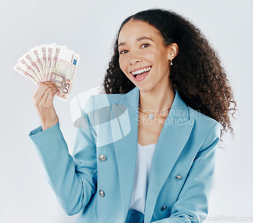 Image of Portrait, happy and cash with a business woman in studio on a gray background making a perfect hand gesture. Smile, finance and money with a female employee holding euro bills for investment