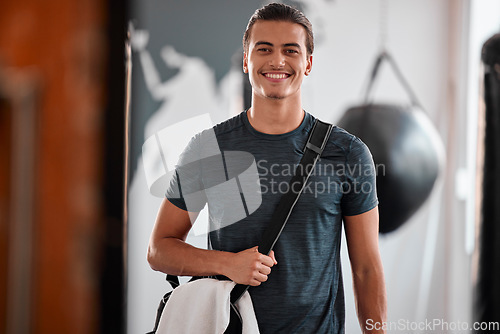 Image of Portrait, fitness and smile of man in gym ready to start workout, training or exercise. Sports, wellness and happy, proud and confident male athlete from Brazil preparing for exercising for health.