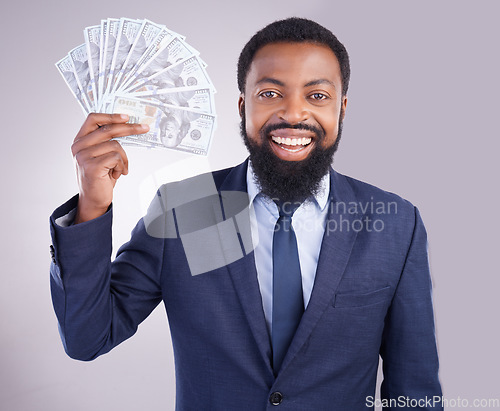 Image of Rich, happy and portrait of a black man with money isolated on a white background in studio. Smile, wealth and an African businessman holding cash from an investment, savings or lottery on a backdrop