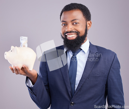 Image of Black man, piggy bank and portrait smile for financial investment or savings against a white studio background. Happy African American businessman holding cash or money pot for investing in finance