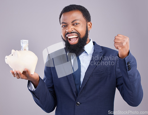 Image of Black man, piggy bank and celebration for financial investment or savings against white studio background. Portrait of excited African businessman holding cash or money pot for winning and investing