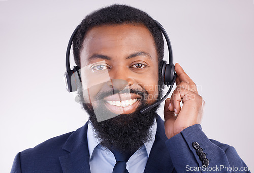 Image of Call center, microphone and portrait of man, studio and consulting questions for customer service. Happy black male, telemarketing consultant and contact us for telecom sales, smile and crm advisory