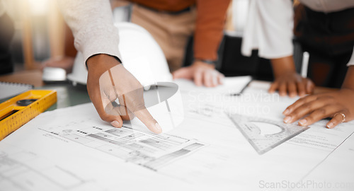 Image of Hands, collaboration and design with a building team working in their office on architecture from above. Teamwork, construction or blueprint with an architect, designer and engineer at work together