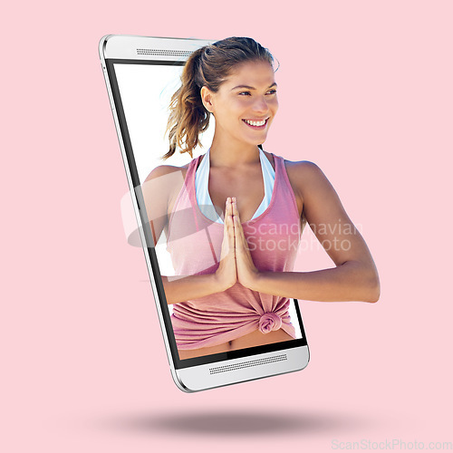 Image of Woman, phone and screen on mockup for yoga, spiritual wellness or exercise against a studio background. Happy female yogi smiling in namaste pose on mobile smartphone display for mental wellness