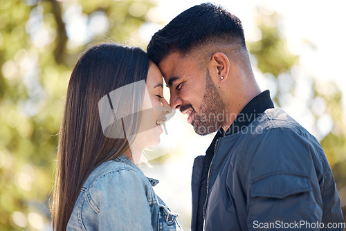 Image of Couple, happy and outdoor with a smile for love, care and happiness together in summer. Head of young man and woman at nature park for affection on romantic valentines day date or vacation to relax