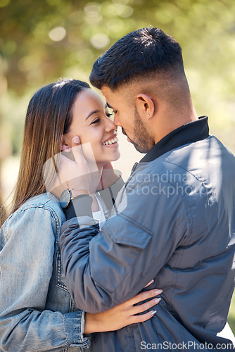 Image of Smile, outdoor and couple with love, care and happiness together in summer. Young man and woman happy face at nature park for affection or kiss on a romantic date, holiday or vacation to relax