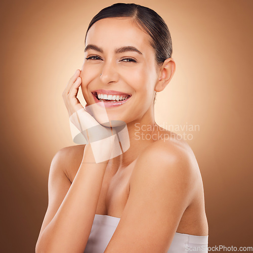 Image of Skincare satisfaction, face portrait and happy woman with luxury facial cosmetics, natural makeup glow and studio beauty. Dermatology, spa salon person and aesthetic female model on brown background