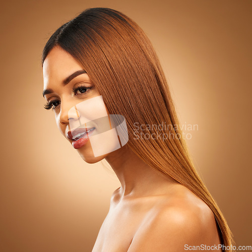 Image of Haircare, beauty and face of woman in studio for growth and color shine or healthy texture. Female style for hair self care, natural make up and hairdresser or salon profile on brown background