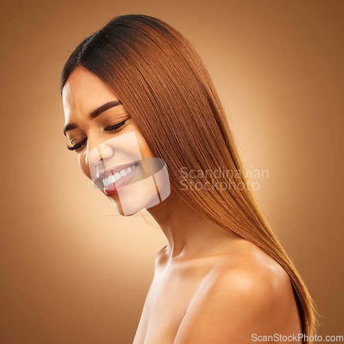 Image of Smile, beauty and hair care of woman in studio for growth, color shine or healthy texture. Aesthetic female happy for haircare, natural skincare and hairdresser or salon mockup on brown background