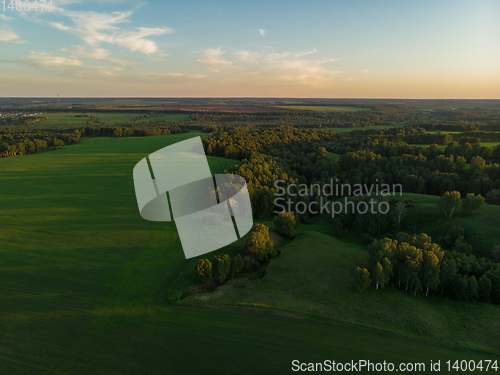 Image of Top aerial view of green fields and meadows