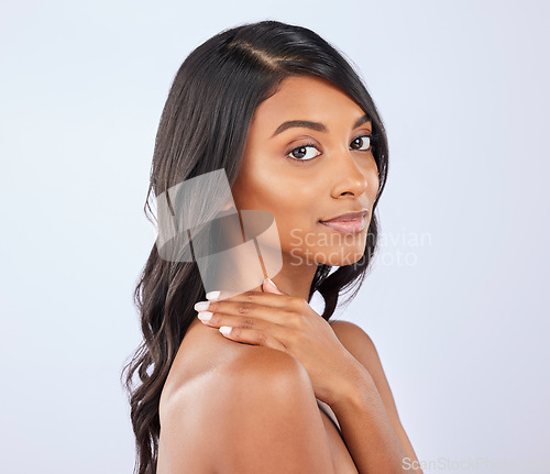 Image of Girl, hair care or woman in studio portrait for healthy natural shine, beauty or wellness on white background. Face of glowing young Indian model or salon spa self care cosmetics for grooming results