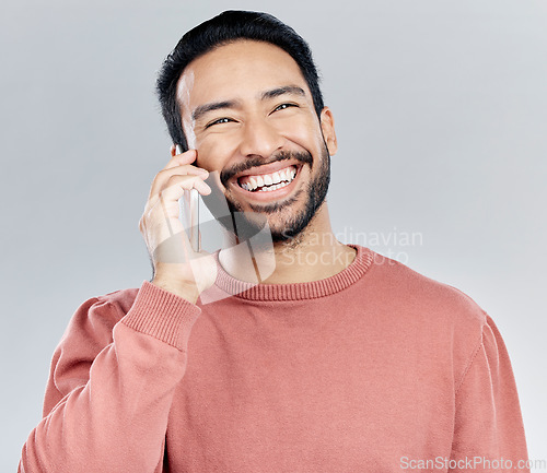 Image of Young asian man, phone call and happy in studio for communication, networking and gray background. Student male model, smartphone and excited smile for chat, listening and conversation with happiness