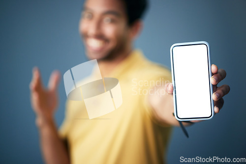 Image of Phone screen, mockup and man hands in studio for advertising website, digital branding and deal coming soon. Closeup male model, smartphone and mock up space for promotion, placeholder and mobile app