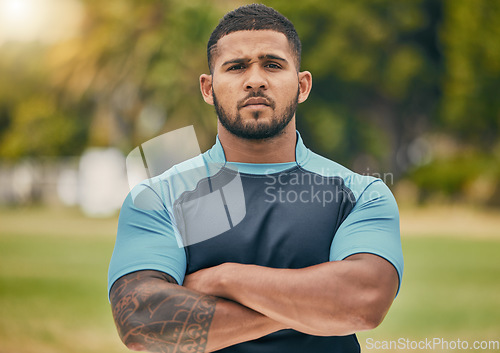 Image of Rugby, field and portrait of confident man with serious expression, confidence and pride in winning game. Fitness, sports and proud face of player at match, workout or competition on grass at stadium