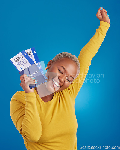 Image of Excited, travel passport and black woman in studio on blue background with flight documents, tickets and ID. Traveling mockup, happy and girl celebrate immigration, holiday and international vacation