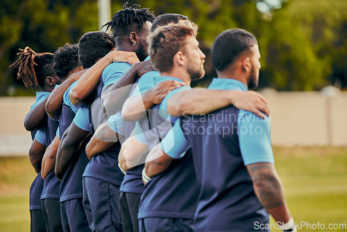 Image of Rugby, team and sports with a group of men outdoor, standing together on a field before a competitive game. Collaboration, fitness and focus with teammates ready for sport at a stadium event