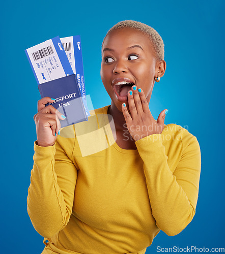 Image of Surprise, travel passport and black woman in studio on blue background with flight documents, tickets and ID. Traveling mockup, happy and girl celebrate immigration, USA holiday and global vacation