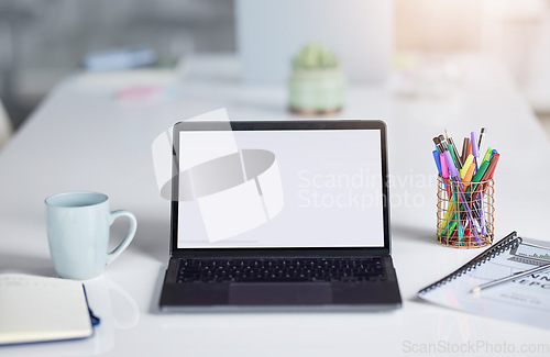 Image of Mockup, white screen or office laptop with advertising space, digital marketing mock up or product placement. Administration, software system or business tech for UX web design, SEO or online website