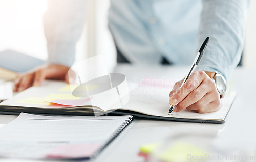 Image of Closeup, hands and notebook for ideas, planning and feedback for review, brainstorming and inspiration. Zoom, male and employee with journal, new project and schedule for proposal, writer and notes