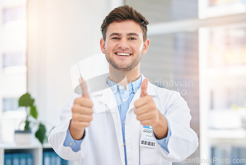 Image of Medical, thank you and thumbs up by doctor in a hospital office feeling happy and excited in a clinic. Support, medicine and portrait of man healthcare professional satisfied in agreement with health