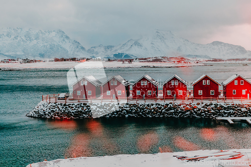 Image of Traditional Norwegian fisherman's cabins and boats