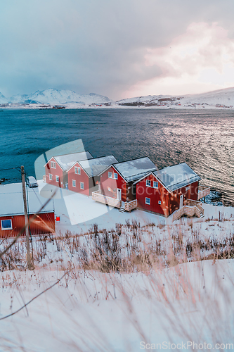 Image of Traditional Norwegian fisherman's cabins and boats