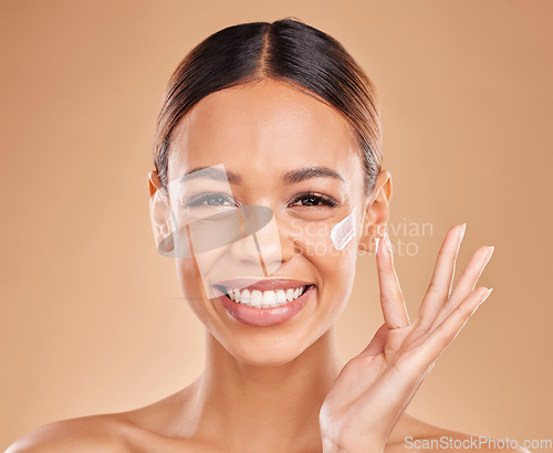 Image of Woman, skincare cream and smile in portrait with beauty, wellness or self care by studio background. Girl, model and happy with cosmetic skin product for natural glow, collagen or dermatology benefit