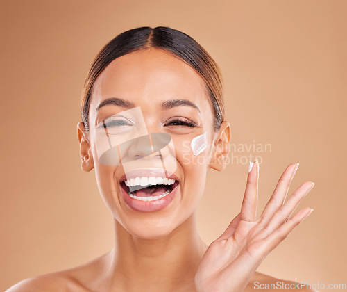 Image of Laughing, skincare portrait or happy woman with cream product for beauty or young face on studio background. Dermatology cosmetics, funny or beautiful girl with facial moisturizer or lotion for glow