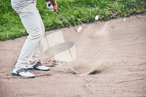 Image of Golf course, man and swing in sand pit for shot, sports and training for hazard with power, aim and fitness. Golfer, bunker and dirt with club with sport, exercise and outdoor mockup space in summer