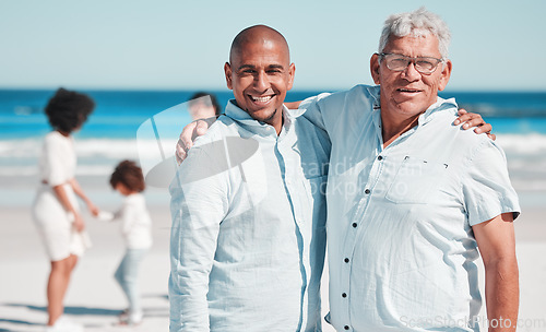 Image of Beach, portrait and senior man with his son while on a summer family vacation, adventure or holiday. Travel, happy and elderly male in retirement with his adult child on tropical seaside weekend trip