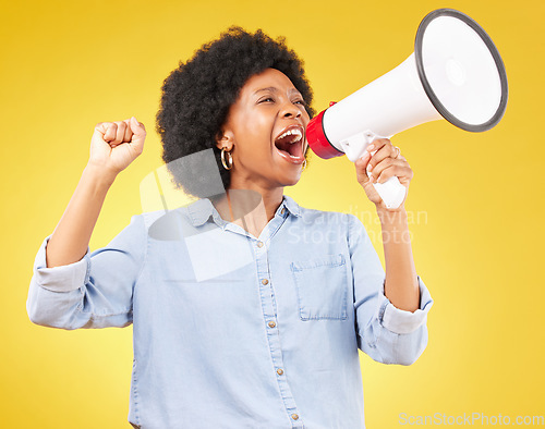 Image of Megaphone announcement, shout or studio black woman protest for democracy vote, justice or human rights rally. Racism opinion, microphone speech or angry justice speaker isolated on yellow background