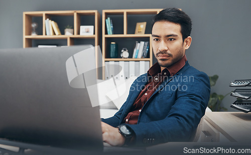 Image of Corporate asian man, laptop and reading in office for email communication, schedule or planning. Entrepreneur, businessman or focus by computer for web design, data analysis or agenda on digital app