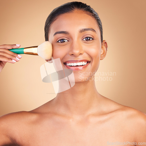 Image of Makeup brush, smile portrait and woman with natural beauty, wellness and happiness from cosmetics. Facial skin glow, happy and cosmetic tool of a young female model with self care in a studio