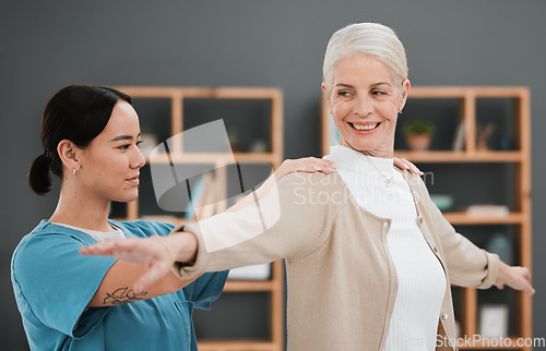 Image of Physiotherapy, senior woman and shoulder massage of a Asian physiotherapist and rehabilitation. Physical therapy, retirement and elderly patient with happiness from arm adjustment and stretching