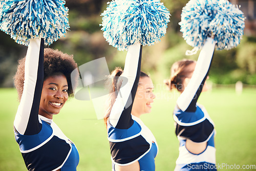 Image of Black woman cheerleader, field and smile in portrait for teamwork or sport motivation in sunshine. Girl, group and fitness for diversity, support or solidarity for balance, muscle or training