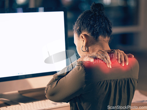 Image of Woman, back pain and computer mockup screen in stress, burnout or overworked at night by office desk. Businesswoman touching painful shoulders by desktop PC with copy space display at workplace