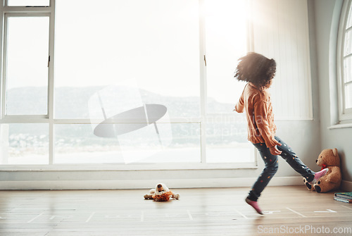 Image of Hopscotch, happy and girl play in home having fun, enjoying games and relaxing in bedroom. Childhood mockup, entertainment and girl with copy space playing, jumping and balance for numbers activity