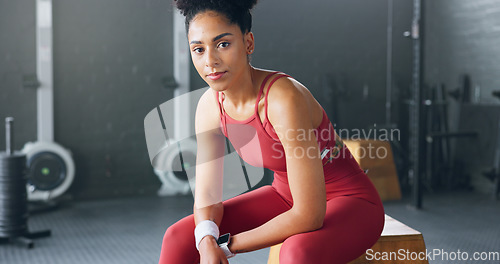 Image of Exercise, motivation and portrait of black woman at the gym ready for workout. Smile, happy and female personal trainer in gymnasium for inspiration in sports, fitness and training for body wellness