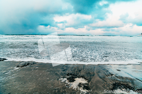 Image of Norway coast in winter with snow bad cloudy weather