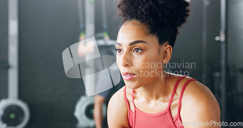 Image of Fitness, gym and woman tired from training and exhausted with body fatigue in a difficult exercise workout. Breathe, challenge and healthy sports athlete or girl resting for energy on a cardio break