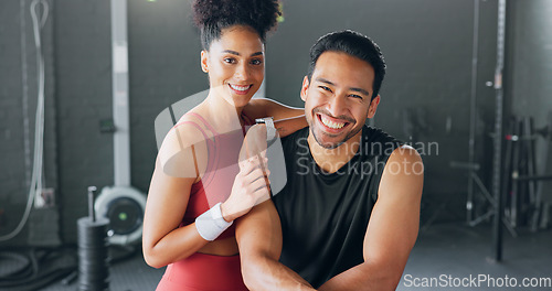 Image of Health, fitness and personal trainer team at gym for exercise, motivation and body goal, happy and relax. Friends, workout and portrait of black woman and man bond, ready and excited for challenge
