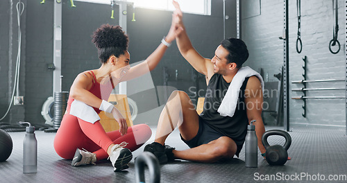 Image of High five, fitness and happy man and women water drink after training workout in gym together. Healthy sports coach, exercise motivation partnership goal success and target team hydrate on floor